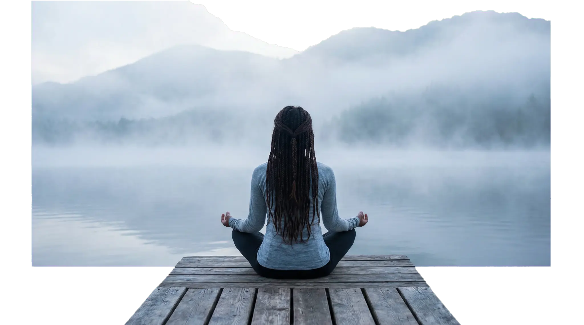Serene lake scene with woman on dock